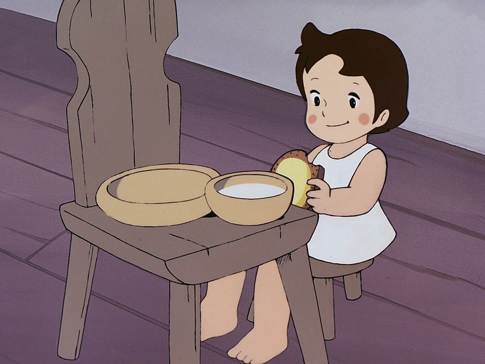 Heidi si gusta il suo formaggio fuso sul pane Heidi si gusta il suo formaggio fuso sul pane